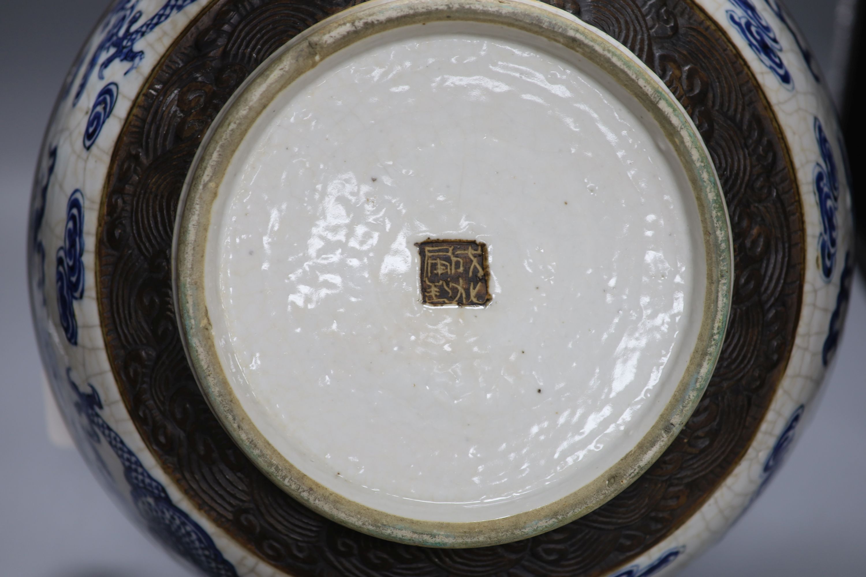 A large Chinese blue and white crackle glazed dragon bowl, 19th century, diameter 37cm
